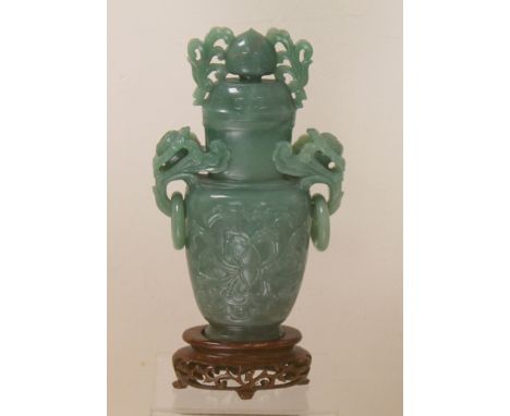 Early 20th century Chinese green jade covered vase with carved Archaic scroll motifs, twin pierced flowerhead ring handles an