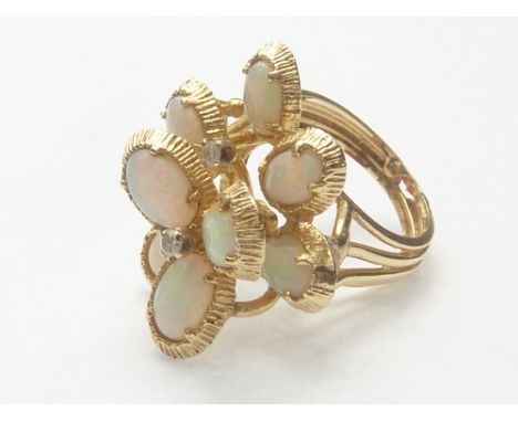 Opal and diamond dress ring in gold '14'. Size 'K'. Condition Report. 12g.