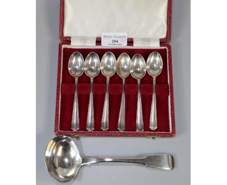 Cased set of six silver Art Deco design reeded edge coffee spoons, together with a George III 'Fiddle Pattern' silver ladle. 