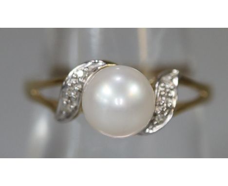 9ct gold cultured pearl and diamond ring.  Ring size O.  Approx weight 1.9 grams.(B.P. 21% + VAT) 