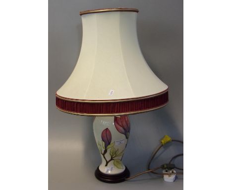 Moorcroft art pottery tube lined table lamp with shade, in the 'Magnolia' pattern.(B.P. 21% + VAT) 