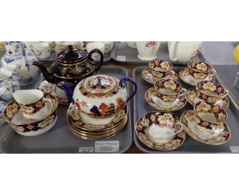 Two trays of china teaware to include: Royal Albert Crown china 21 piece part teaset and a similar W. Ridgways oriental desig