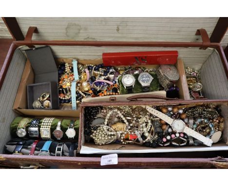 Vintage leather suitcase to include: a collection of vintage and other jewellery, fan, watches, leather glove box etc. (B.P. 