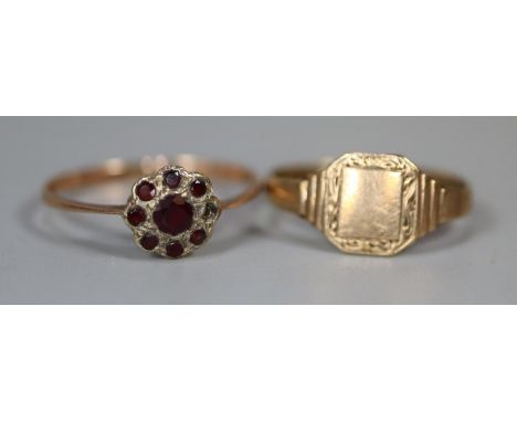 9ct gold signet ring and a 9ct gold garnet cluster ring (one stone missing).  Ring size M and Q.  Approx weight 2.6 grams.(B.