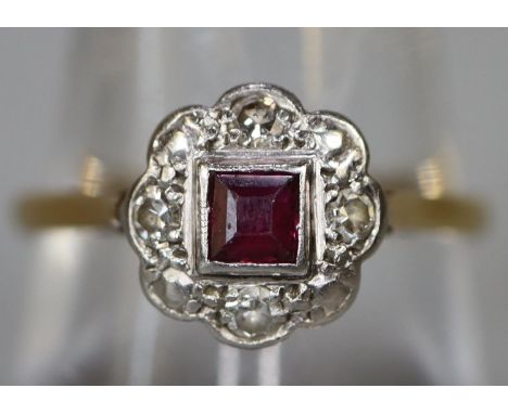 Yellow metal ruby and diamond ring. Ring size Q. Approx weight 3.2 grams. (B.P. 21% + VAT) Condition is good, no obvious dama