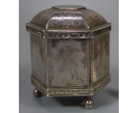 20th century white metal octagonal shaped box with domed cover, overall engraved with religious and other figural panels on t