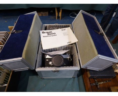 A Cantilevered Camera Case Containing Two Cannon SLR Cameras, Four Lenses, Colour Flash Gun Etc