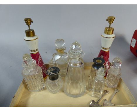 A Collection of Glass and Ceramic Sent Bottles 
