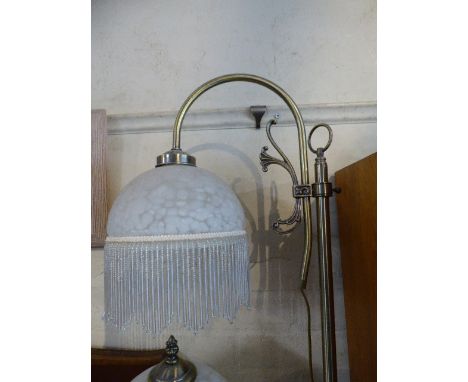 A Modern Brass Adjustable Reading Lamp with Glass Shade