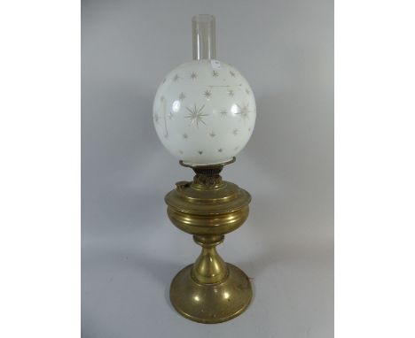 A Brass Oil Lamp with Etched Opaque Globe and Duplex Controls, 58cm high 