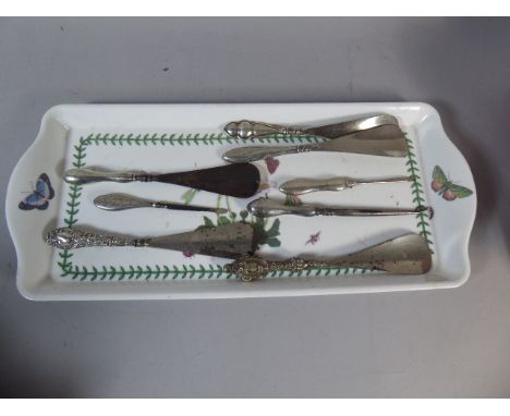 A Collection of Eight Silver Handled Button Hooks, Manicure Tools and Shoe Horns