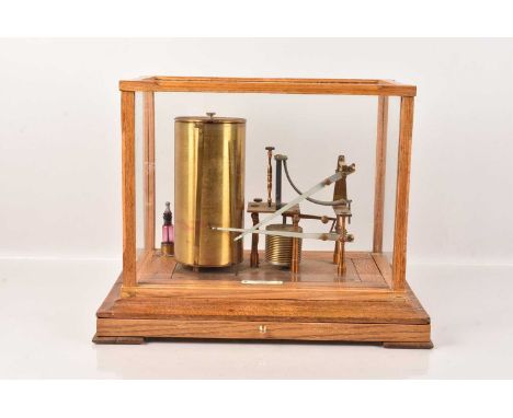 A large Barograph by J.H.Steward of London, having large wind up mechanised drum, in wooden and glazed case, case 35cm/13 3/4
