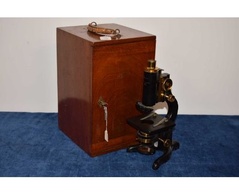 A 'Service' monocular microscope by W.Watson &amp; Sons Ltd, serial 60339. complete with a two eye pieces, various magnificat