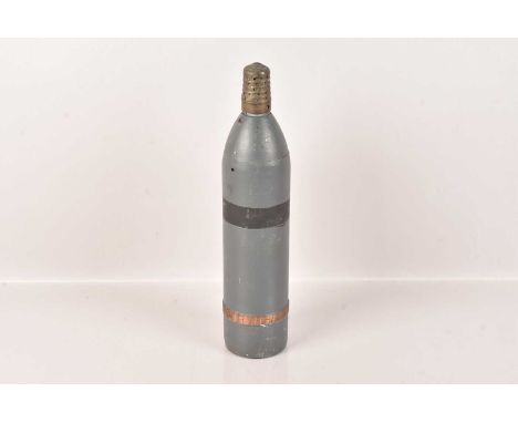 An Inert Round with a small Timer Fuse, marked to the base 'C' and '26', 33.5cm H including fuse, 7cm diameter