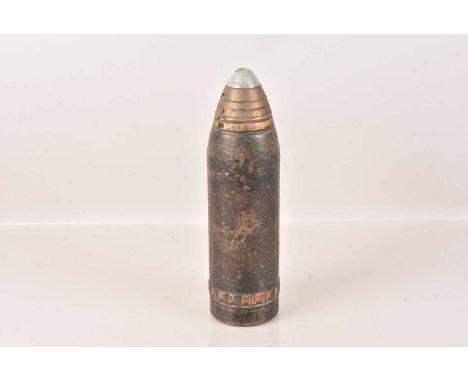 A large Inert Round, having timer fuse, having multiple markings to the fuse, including 5/16, 28 within a circle and 195, 30c