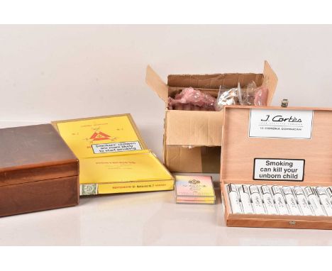 An assortment of Cigars, to include Montecristo No.2 Habana, J.Cartes Corona Dominican, Cohiba and more, plus a humidor (parc