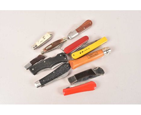 An assortment of Pocket Knives, various styles and makers, to include Victorinox, Imperial, Taylors, Opinel, Schrade and more