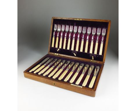 A cased part set of Victorian silver fish knives and forks, Levesley Brothers, Sheffield 1893-1896, comprising; twelve knives