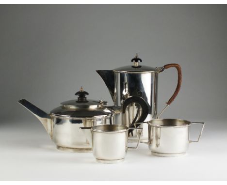 An Art Deco four piece silver tea service, Frank Finley Clarkson, London 1946 & 1948, each piece of circular plain polished f