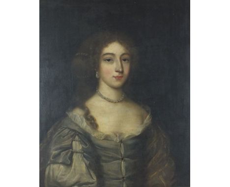English school, early 17th century, Portrait of a lady, half length wearing a green dress with hair over her right shoulder, 