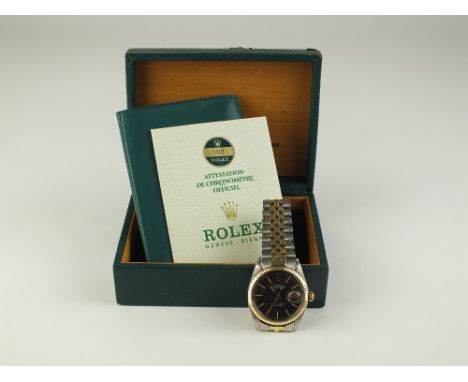 A Gentleman's Rolex Oyster Perpetual Datejust Superlative Chronometer stainless steel and yellow metal wristwatch, the dark g