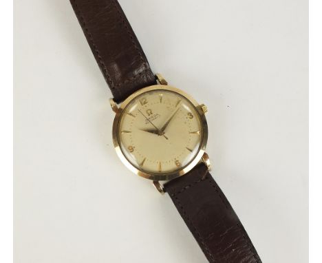 A Gentleman's 9ct gold Omega Automatic wristwatch, the silvered dial with batons, Arabic numerals and sweep seconds hand, wit