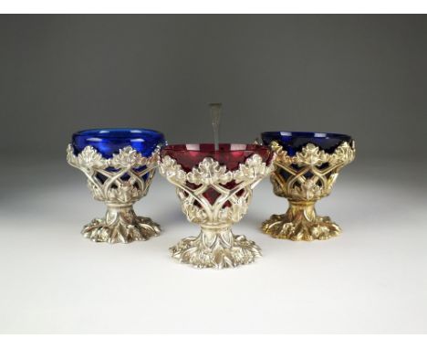 A set of three silver salts, Henry Wilkinson & Co, Sheffield 1825, 1837 & 1844, each of circular pedestal form with pierced d