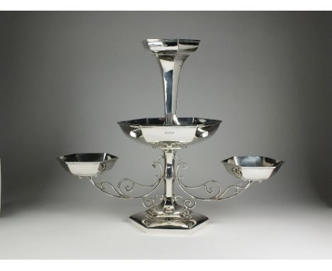 A George V large silver table epergne, Walker & Hall, Sheffield 1910, designed as a central hexagonal bowl supporting taperin