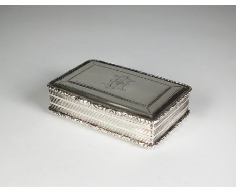 A Victorian silver snuff box by Nathaniel Mills, Birmingham 1840, of rectangular form with cast scroll decoration and engrave