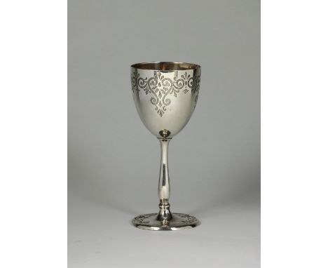 A Victorian silver goblet, Martin, Hall & Co, Sheffield 1865, with engraved decoration and monogram, raised on baluster stem 