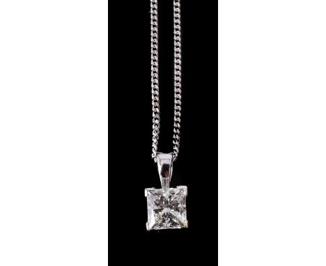 A diamond pendant, the princess cut diamond, estimated to weigh 1.00 carat, on a curb link chain, stamped 750, 45.5cm long, 4