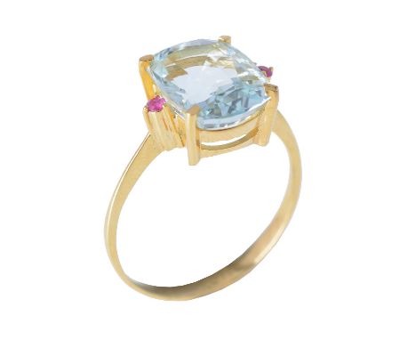 An aquamarine and ruby dress ring, the cushion cut aquamarine within a four claw setting, to circular cut ruby set shoulders,