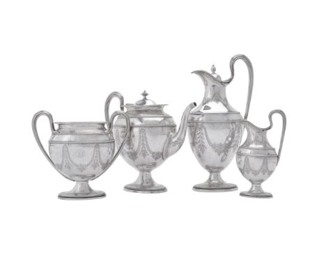 Y A Victorian silver four piece oval pedestal tea set by Martin, Hall & Co., Sheffield 1864, the tea pot with a beaded oval f