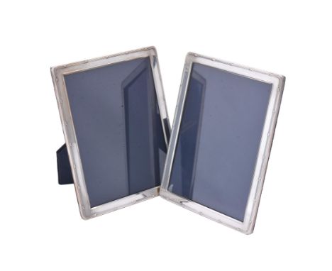 A pair of silver mounted photo frames by Carr's of Sheffield Ltd., Sheffield 2007, with reed and stitch borders, 22.5cm (8 3/