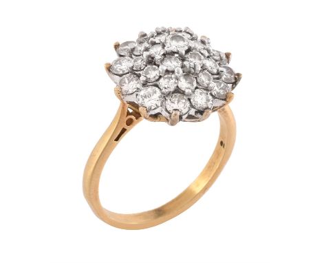 A diamond cluster ring, the cluster set with graduated brilliant cut diamonds, approximately 1.42 carats total, the shank sta