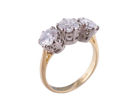 An 18 carat gold diamond three stone ring, set with three brilliant cut diamonds, approximately 2.25 carats total, in claw se