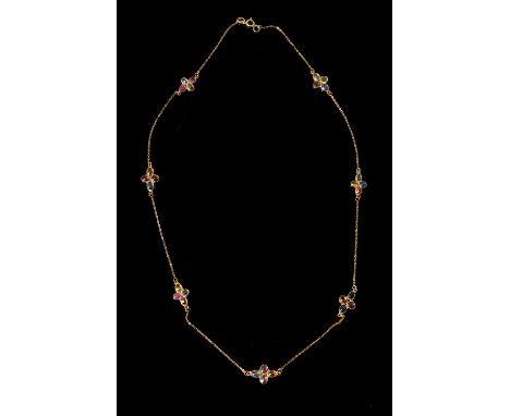 A coloured sapphire necklace, the oval cut coloured sapphires in quatrefoil settings, to belcher link chain connectors, to ri