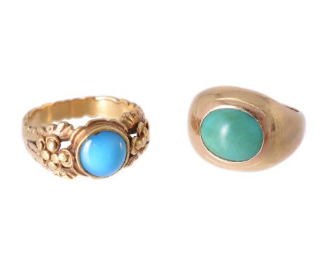 A turquoise dress ring, the oval cabochon turquoise within a gold coloured setting, finger size H; together with a blue paste