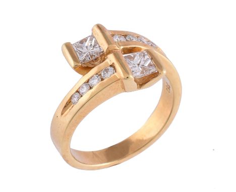 A diamond crossover ring, the two Princess cut diamonds, estimated to weigh 0.60 carats total, in a crossover setting with br