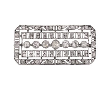 A mid 20th century diamond plaque brooch, the pierced panel with a central row of graduated old brilliant cut diamonds, appro