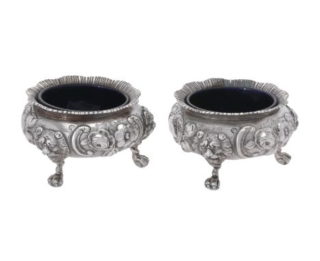 A pair of Victorian silver cauldron salts by Daniel & Charles Houle, London 1856, with shaped borders, chased with floral spr