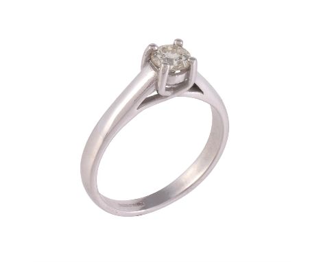 A single stone diamond ring, the brilliant cut diamond estimated to weigh 0.35 carats, in a four claw setting, hallmarked 18 