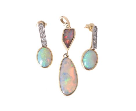 A pair of opal and diamond ear pendants, the oval cabochon opals suspended below old cut diamond set bars, approximately 0.30