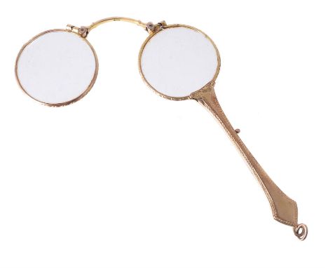 A pair of 9 carat gold lorgnettes, import mark for Birmingham 1922, with an engine turned handle, 12.5cm longCondition Report