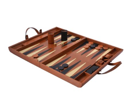 Mufti, Michael d'Souza, a leather cladded backgammon board, the leather case opening to a leather board, with leather cladded