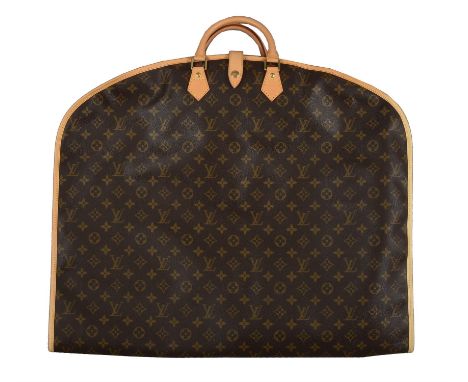 LOUIS VUITTON MONOGRAM VANITY CASE, with leather trims, shoulder strap and  name tag, gold tone hardware, push lock closure, inside a mirror, two  pockets and a leather strap, 32cm x 22cm H