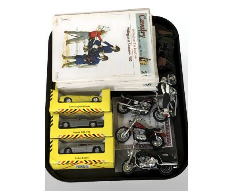 A group of Maisto miniature Harley Davidson motorcycles, three Shell sports car collection die cast model vehicles, assorted 