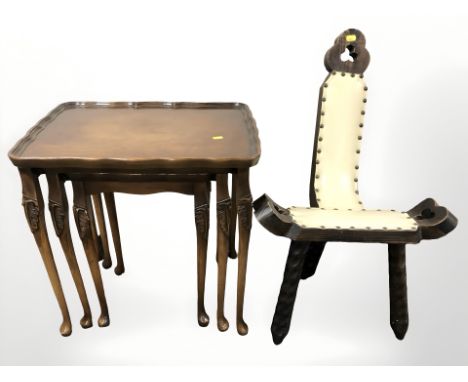 A nest of three beech tables and a pine tripod stool.