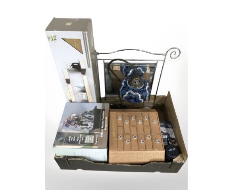 A modern multi drawer chest, water fountain, set of floating shelves, mirror, mosaic glass table lamp, etc. (1 box)