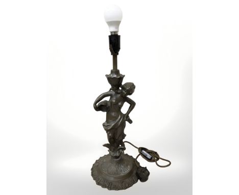 A patinated metal figural table lamp, in the form of a lady, height 64 cm 